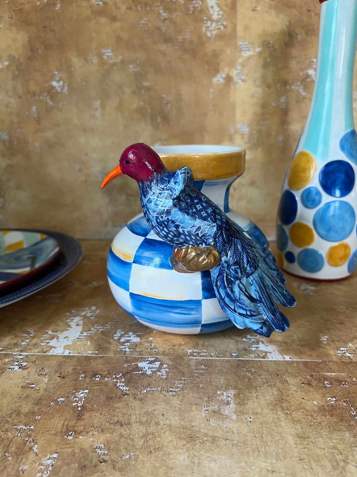 Vase with fancy bird
