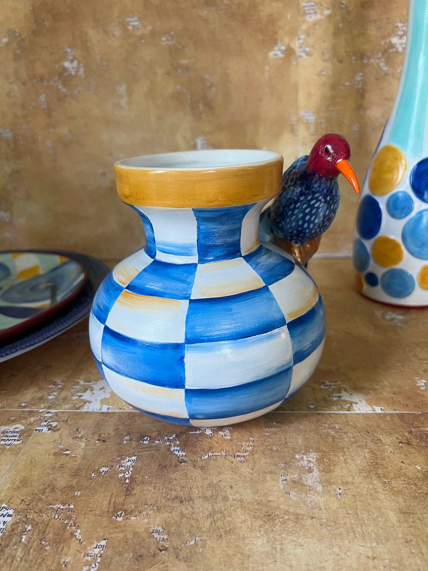 Vase with fancy bird