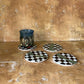 Checkered coasters with green and gold accents