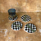 Checkered coasters with green and gold accents