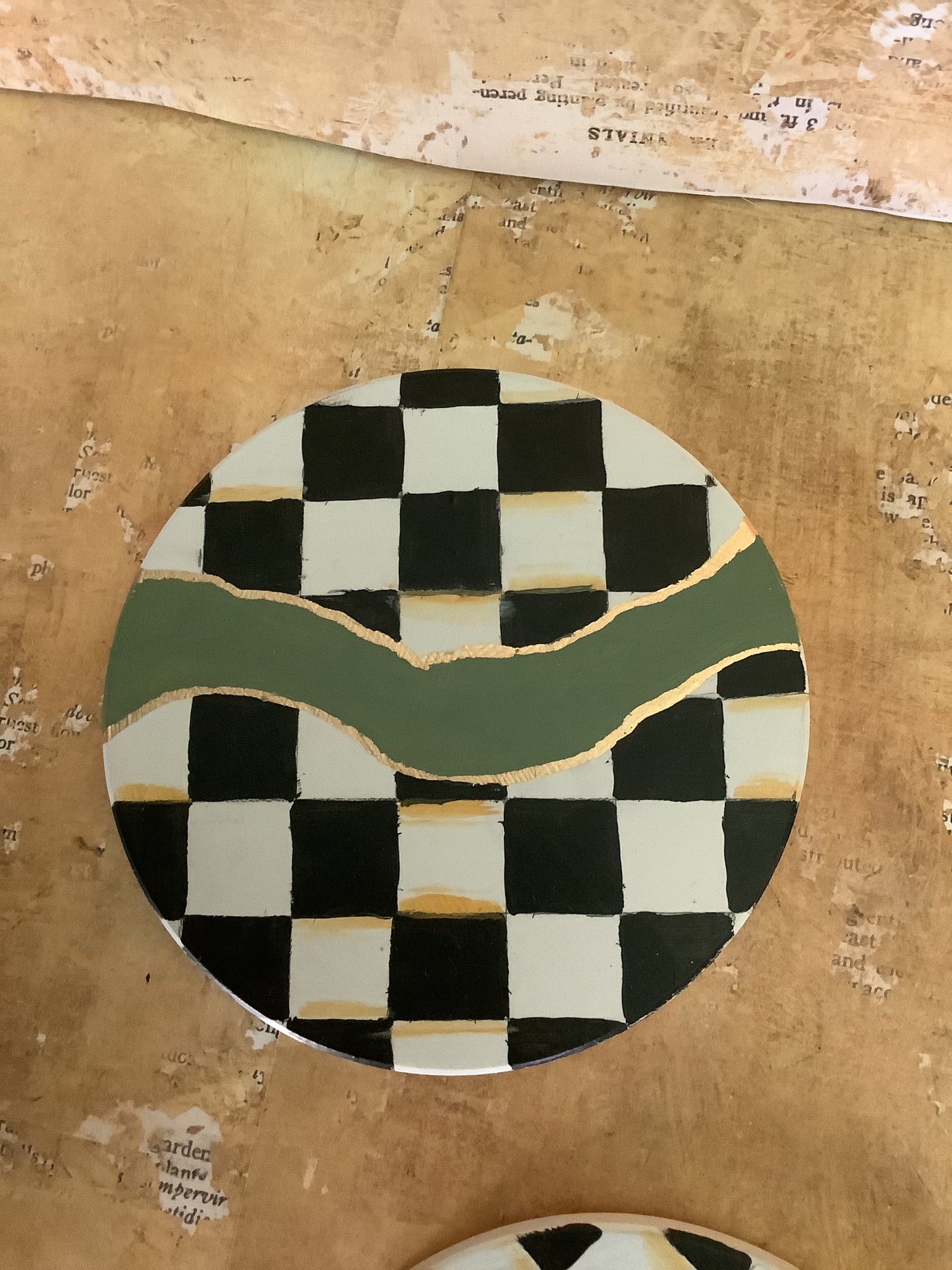 Checkered coasters with green and gold accents