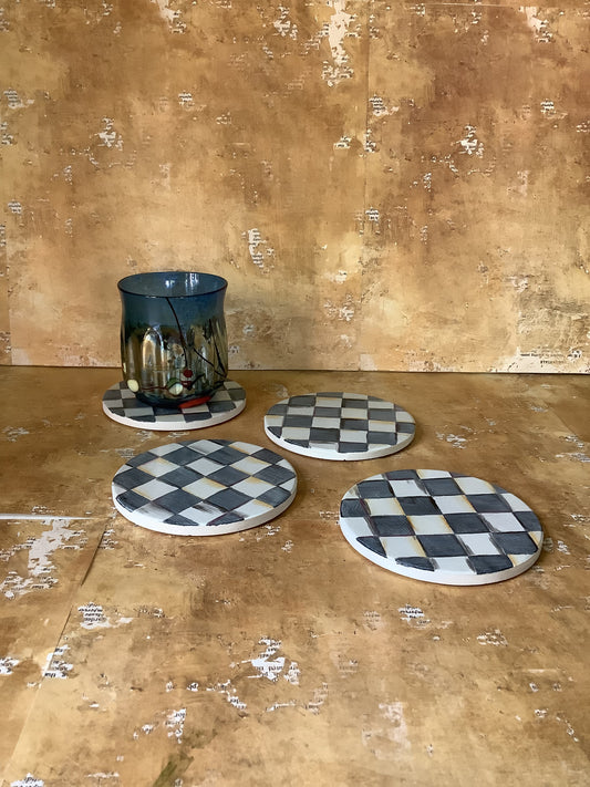 Charcoal and white checkered coasters