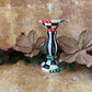 Snow-flecked pillar candleholder