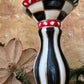 Snow-flecked pillar candleholder