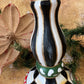 Snow-flecked pillar candleholder